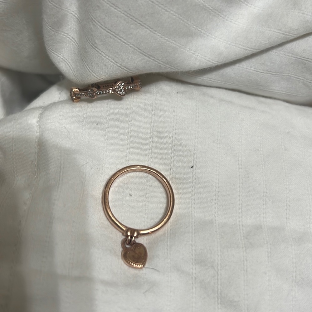Size 7 pandora rings. Rose gold. Very well taken care of. Set of 2.